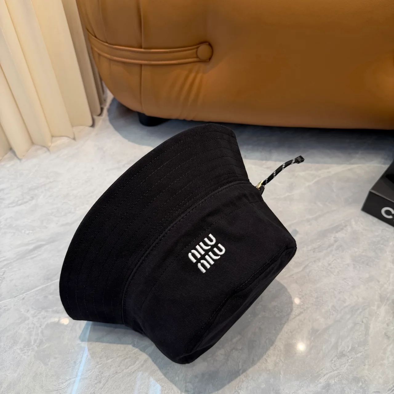 Miu Miu Embroidered Bucket Hat in Black · view 7