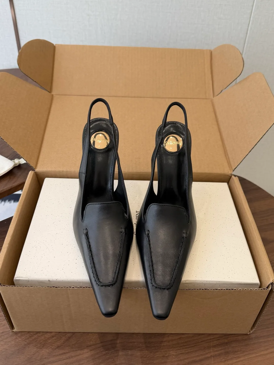 Saint Laurent Cowhide Slingback Heels in Black · view 1