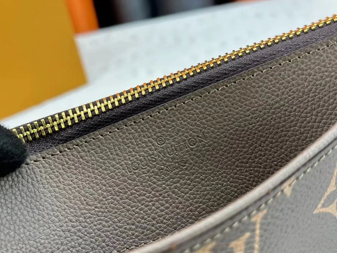 Louis Vuitton Calfskin Wristlet Pouch in Brown · view 6