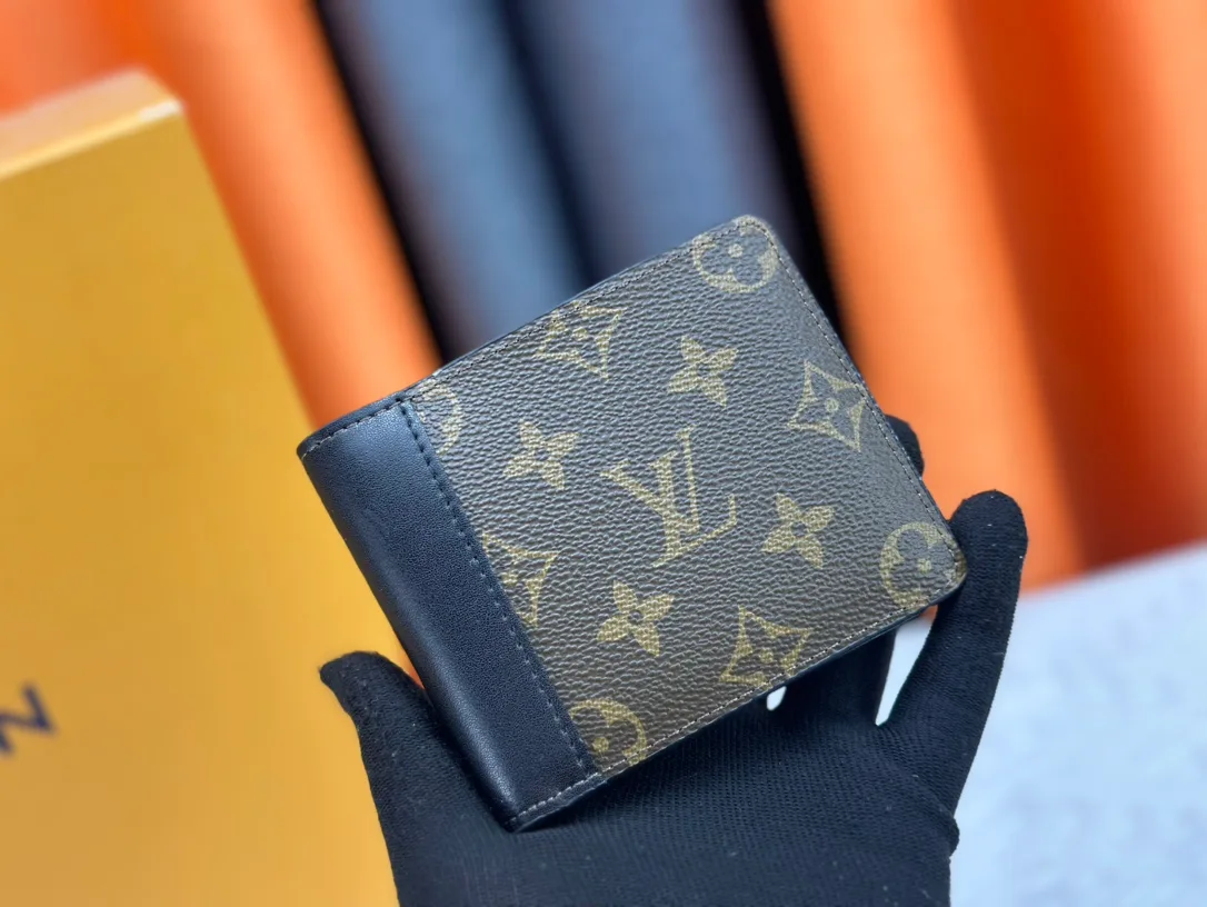 Louis Vuitton Cowhide Canvas Smooth Bifold Wallet in Brown · view 1