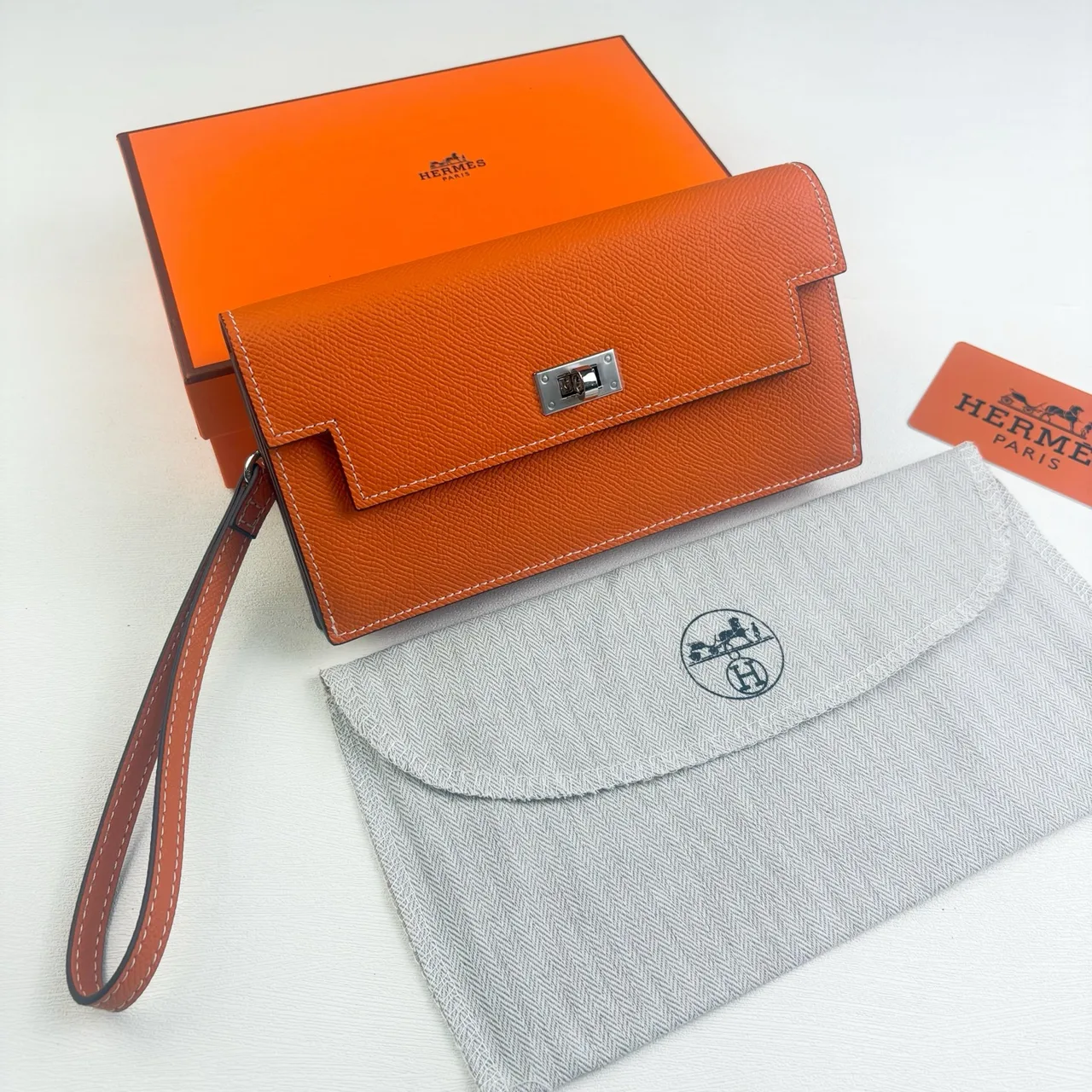 Hermes Wristlet Wallet in Orange & Blue & Grey & Black & White & Brown & Red · view 1