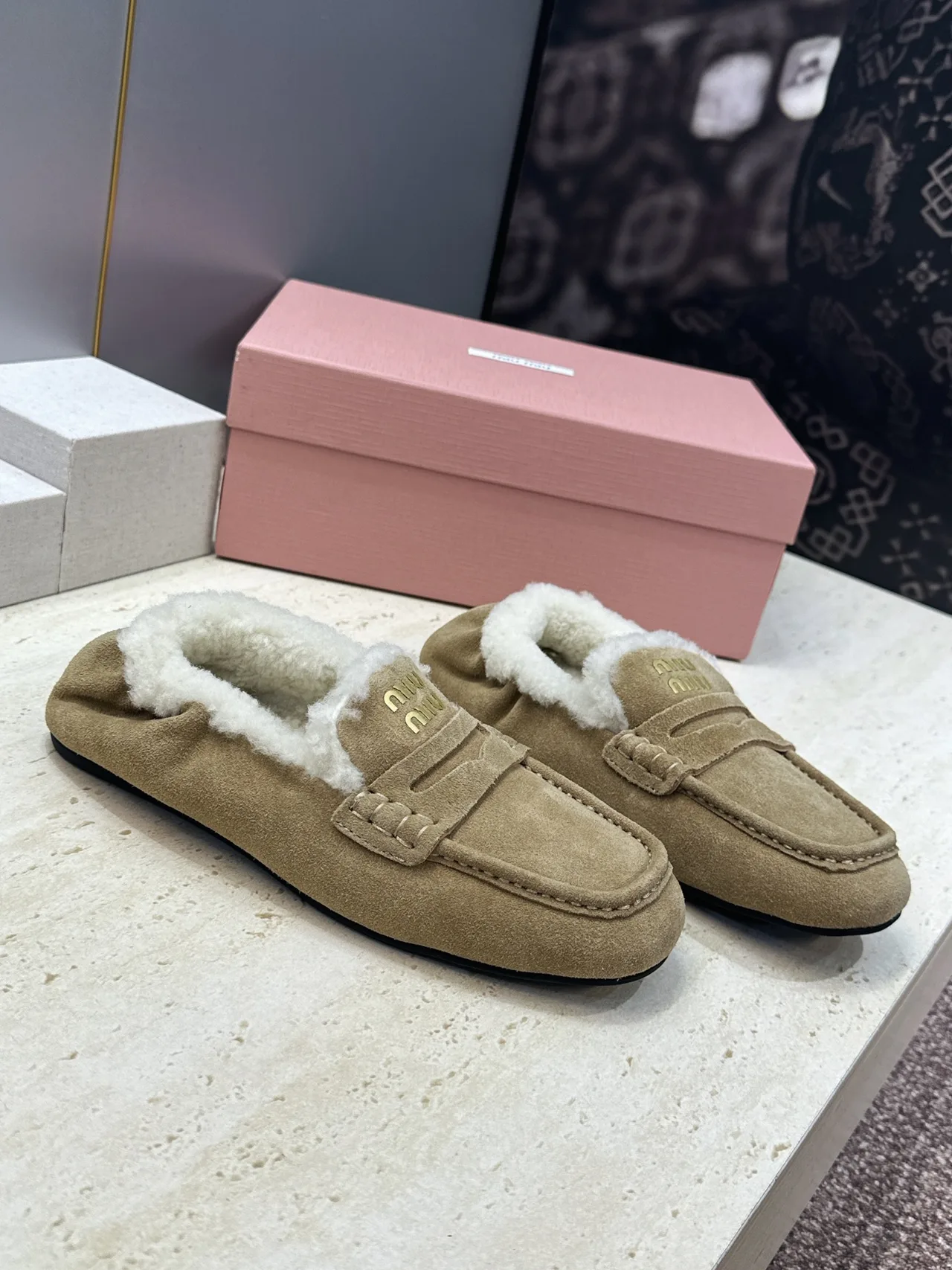 Miu Miu Round-Toe Slippers in Beige · view 1