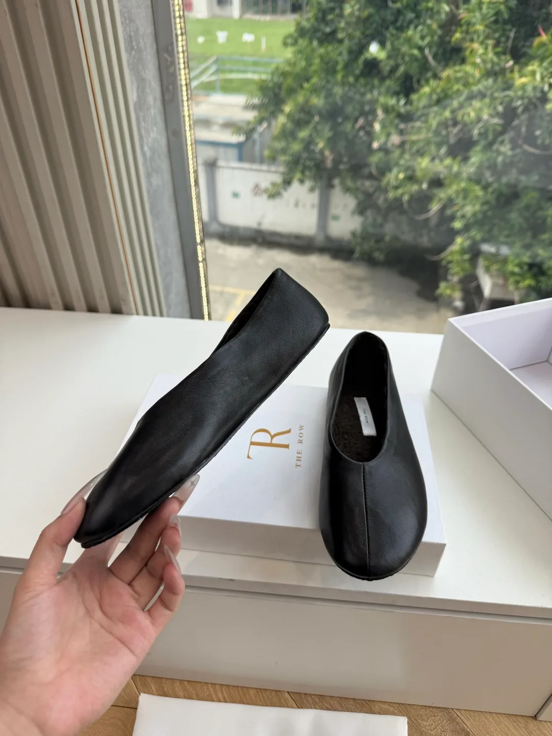 The Row Cowhide Smooth Round-Toe Ballet Flats in Black · view 2