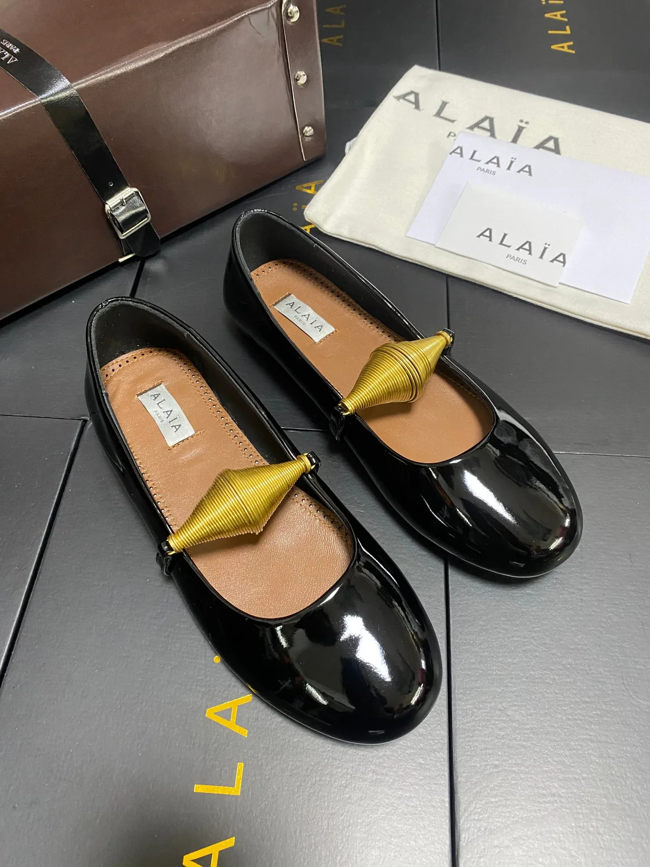 Alaia Cowhide Sheepskin Glossy Square-Toe Mary Jane Flats in Black · view 2