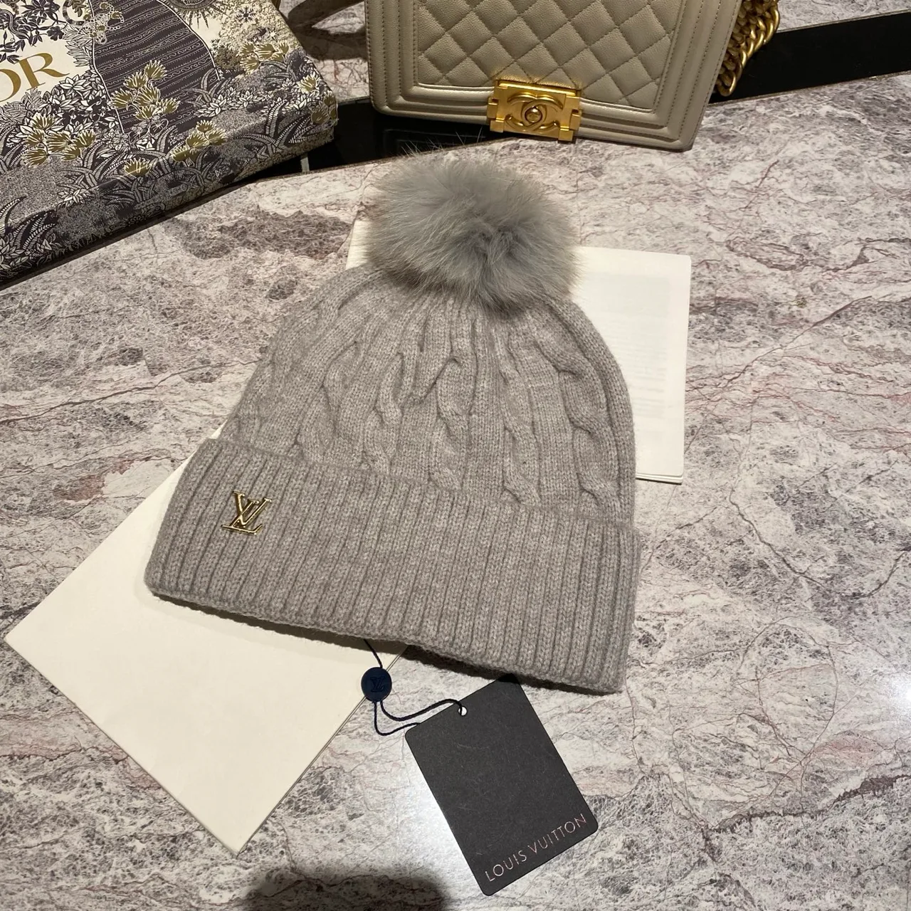 Louis Vuitton Cable knit pom beanie in Black & White & Blue & Burgundy & Cream & Grey & Brown & Pink · view 6