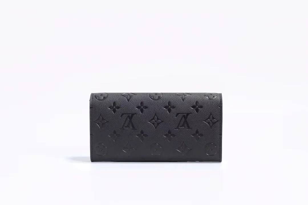 Louis Vuitton Cowhide Long Wallet in Black · view 3