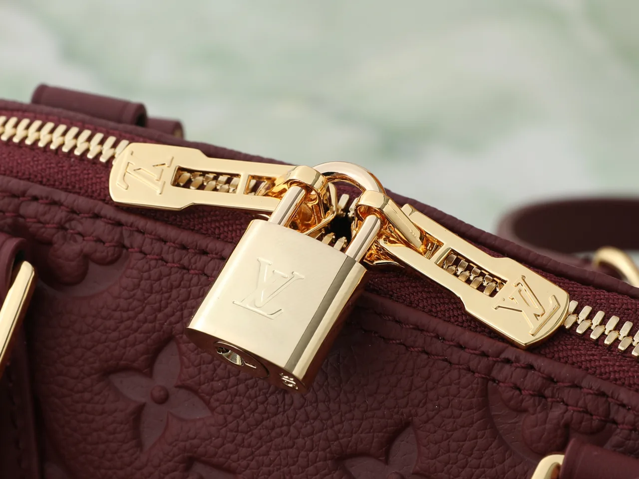 Louis Vuitton Leather Quilted Top-Handle Bag in Burgundy · view 6