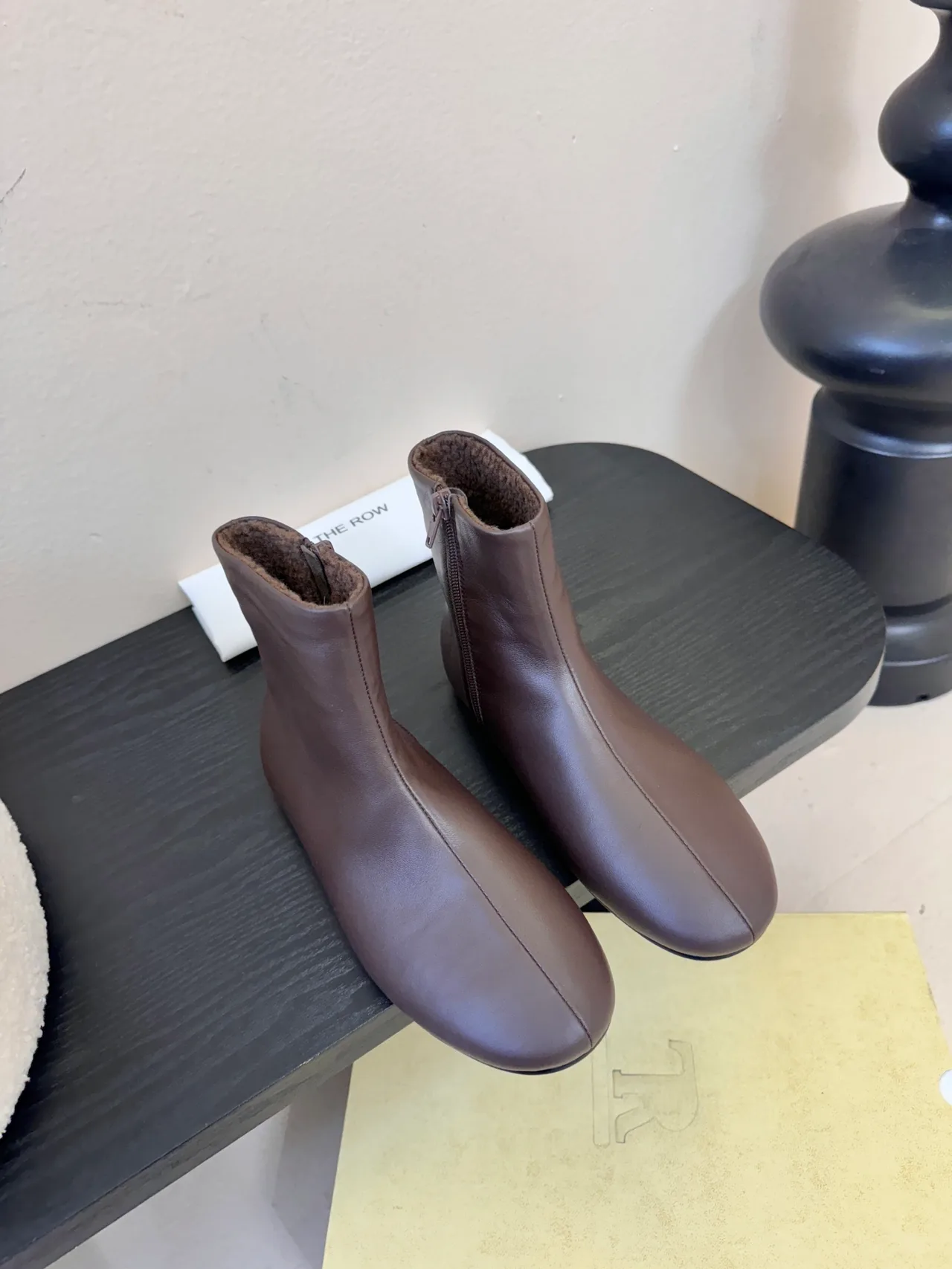The Row Smooth Round-Toe Ankle Boots in Brown · view 1