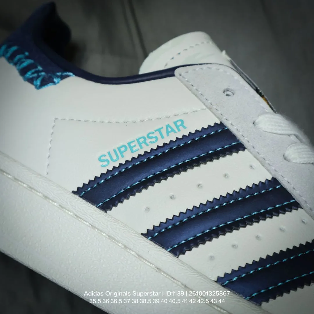 Adidas Striped Low-Top Sneakers in White · view 7