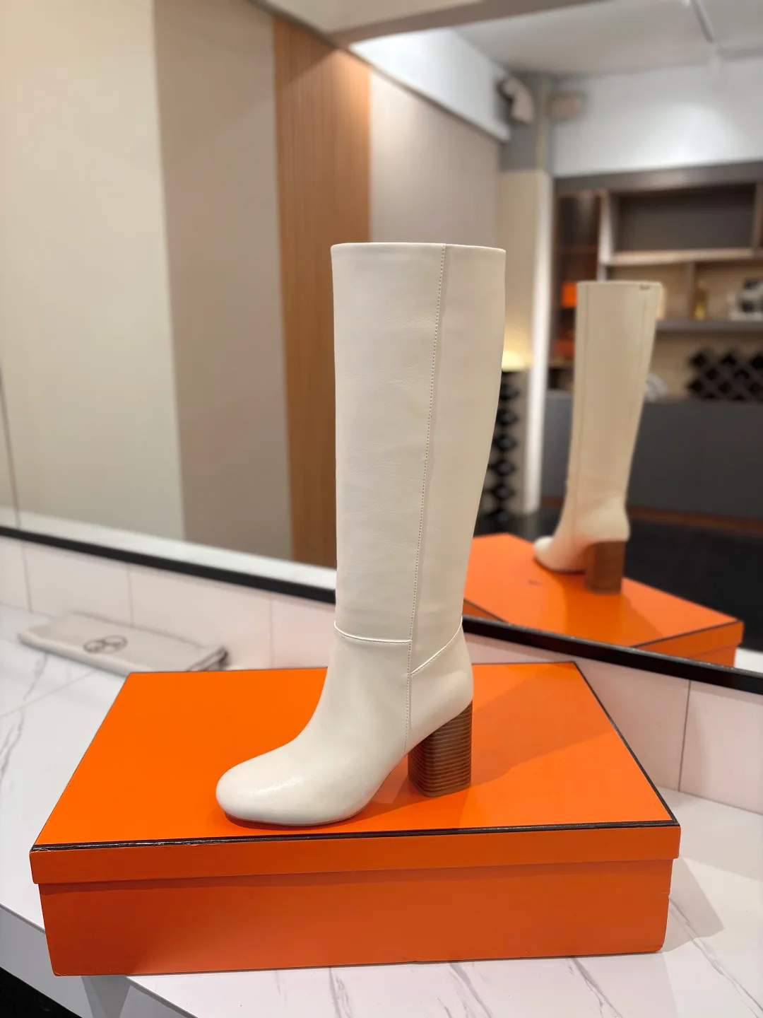 Hermes Cowhide Matte Round-Toe Knee-High Boots in White · view 6