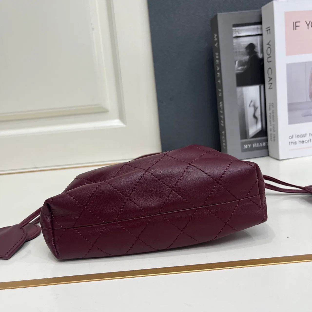Chanel Quilted Crossbody Bag in Burgundy · view 7