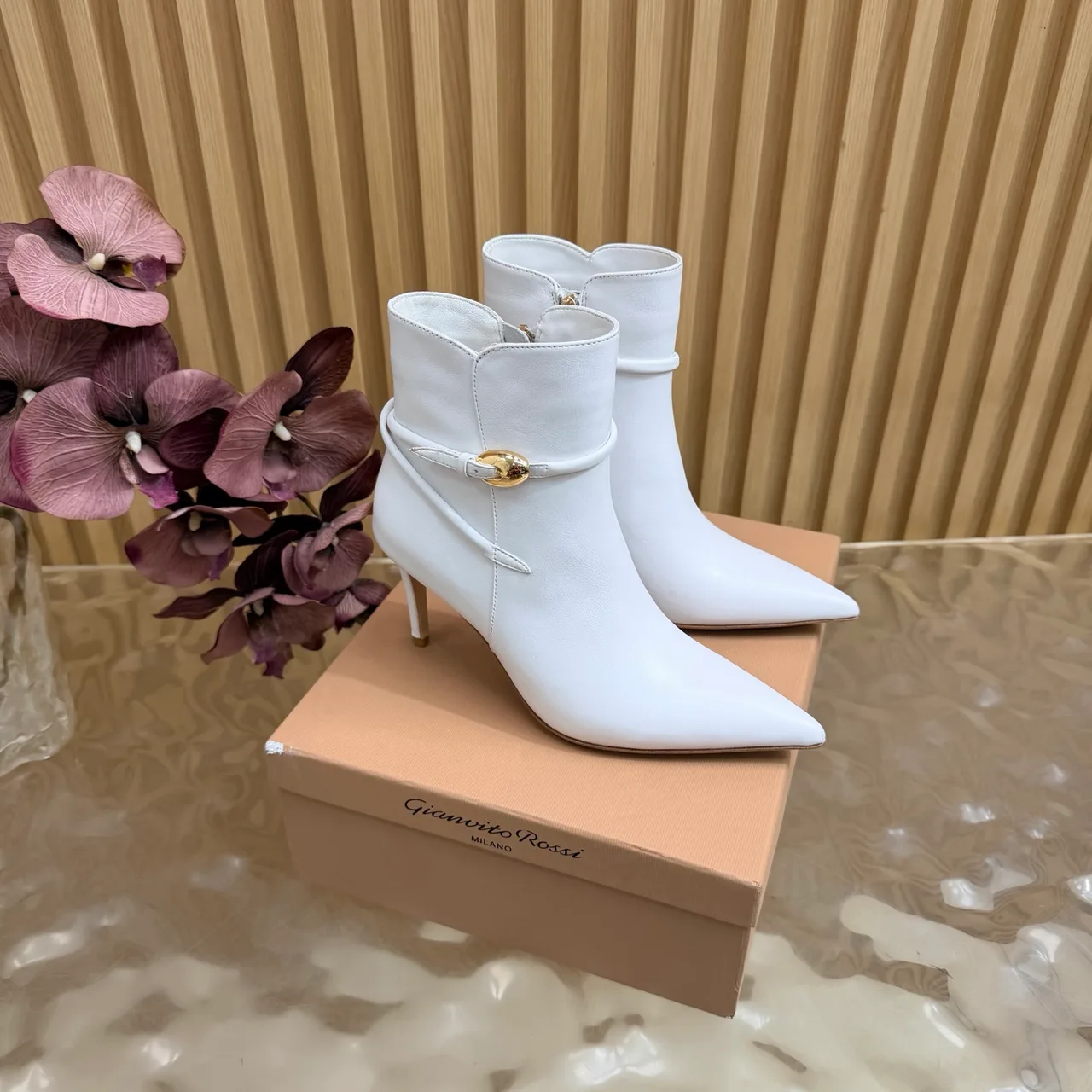 Bottega Veneta Glossy Pointed-Toe Buckle Ankle Boots in White · view 1