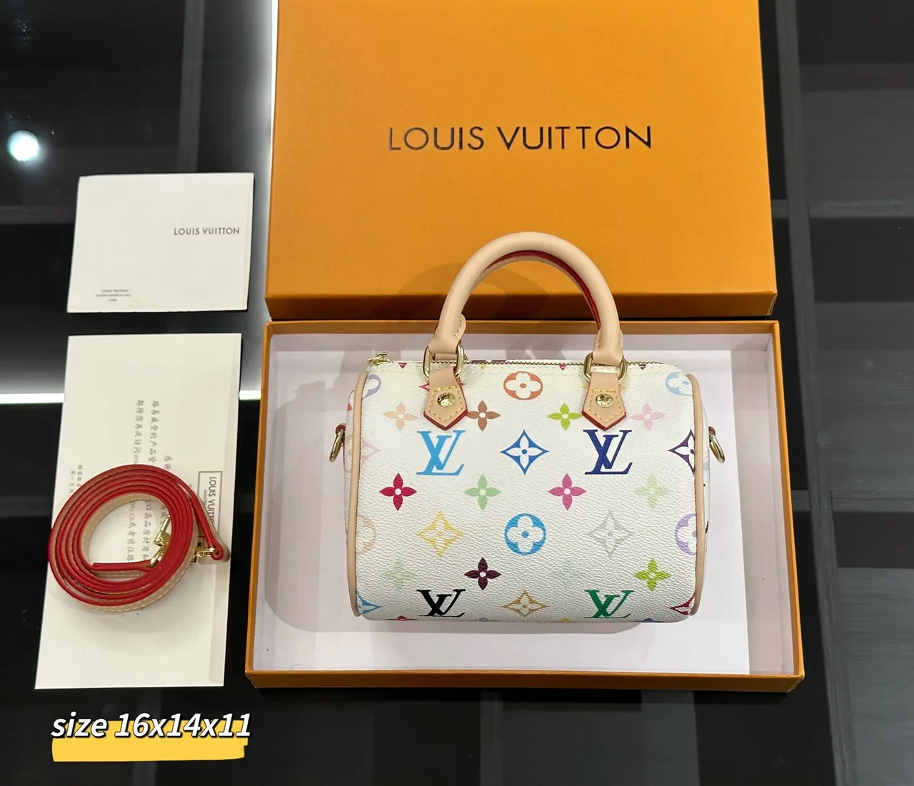 Louis Vuitton Alma Bag in Brown / White / Beige / Yellow · view 5