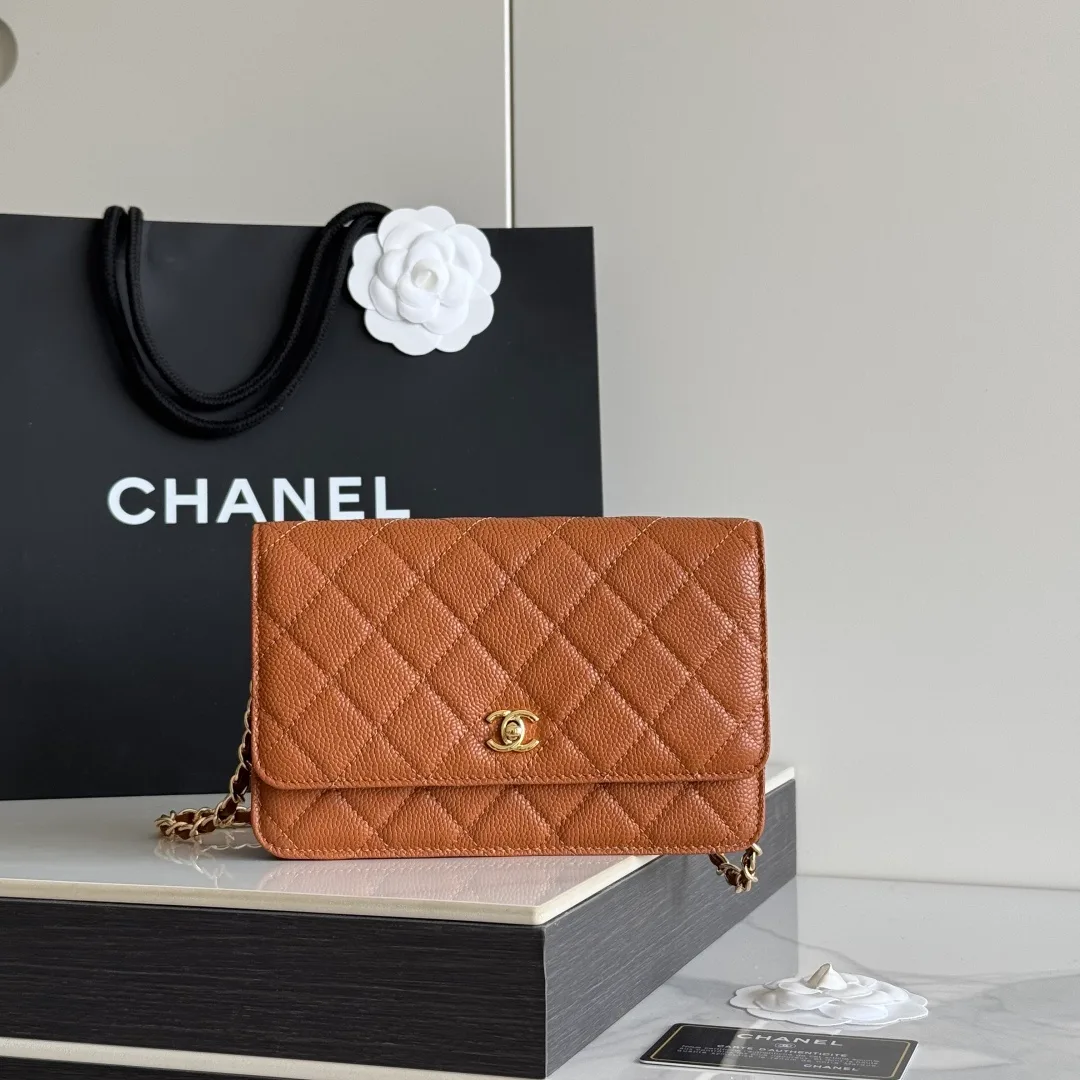 Chanel Calfskin Quilted Clutch in Tan · view 1