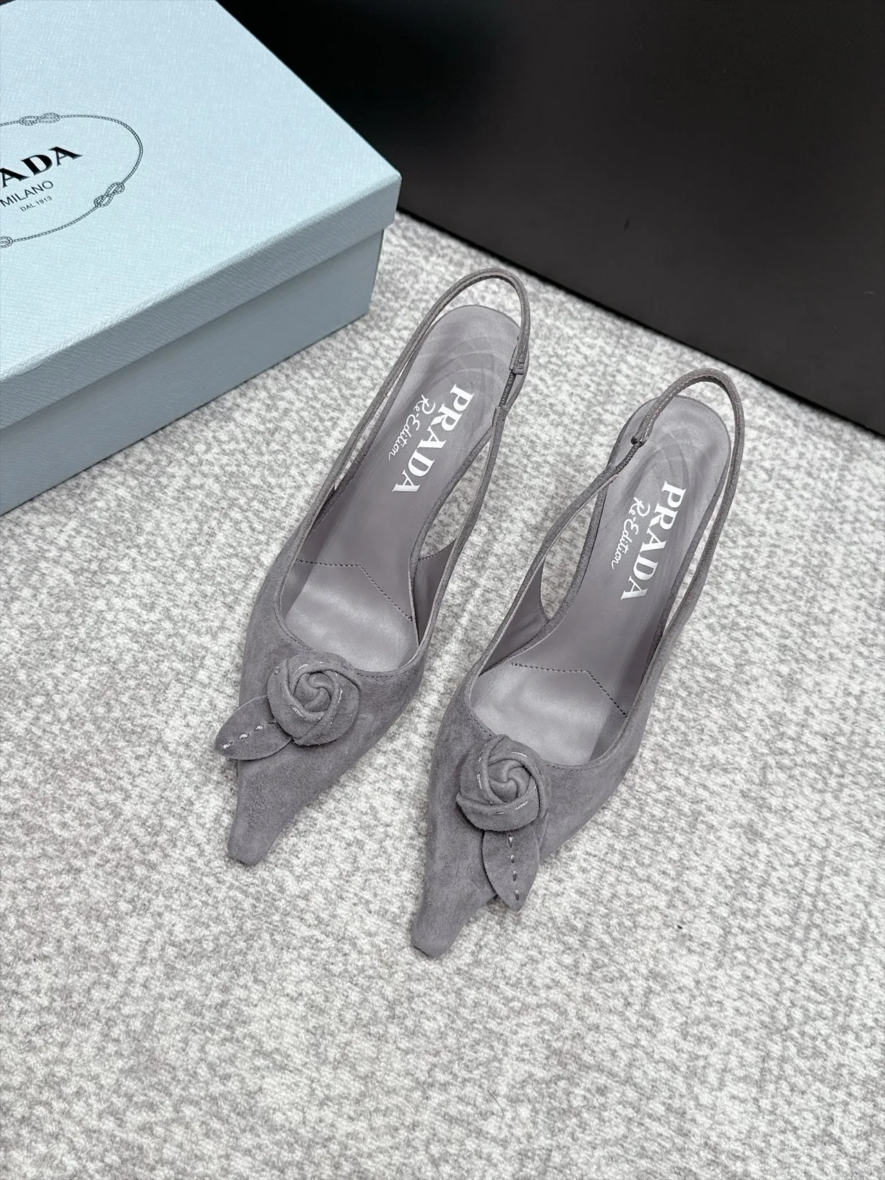 Prada Pointed Slingback Pumps in Grey · view 1