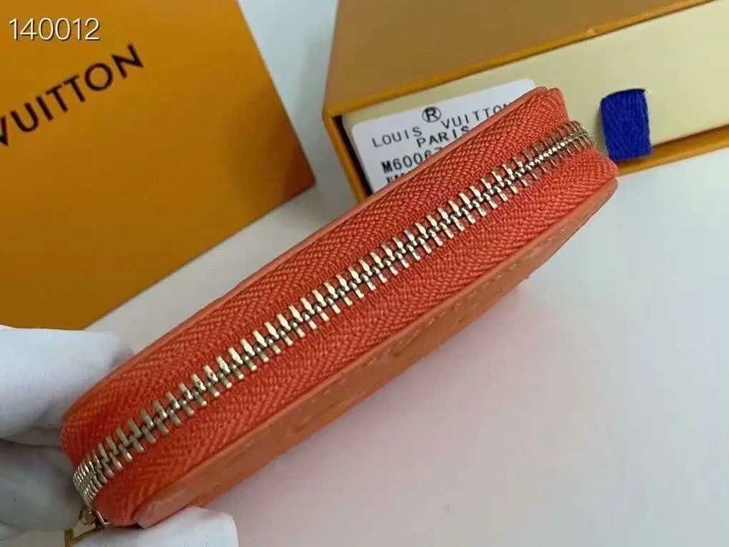 Louis Vuitton Zip Coin Wallet in Orange · view 6