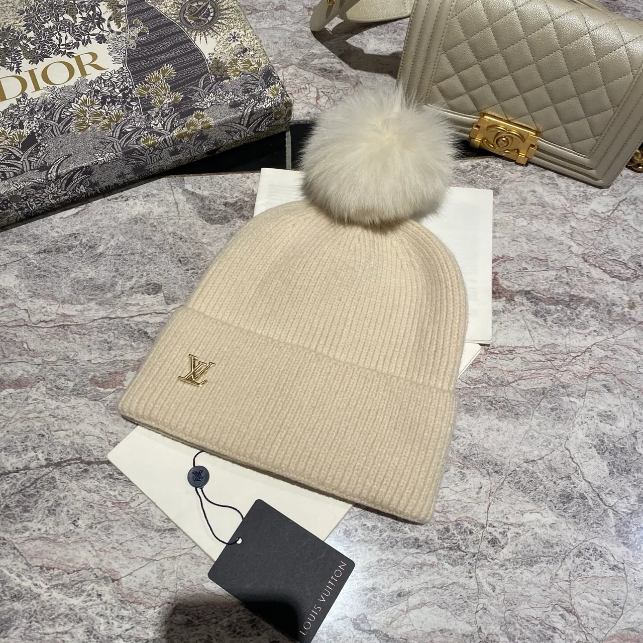 Louis Vuitton Pom-Pom Beanie in Black & White & Blue & Pink & Beige & Grey & Cream & Burgundy & Red & Tan · view 7
