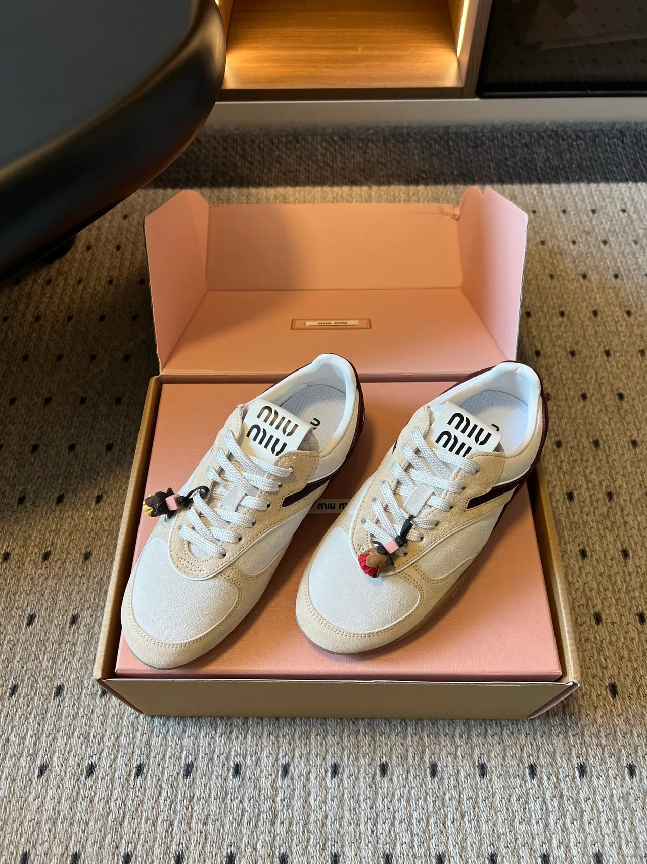 Miu Miu Low-Top Sneakers in Cream · view 2