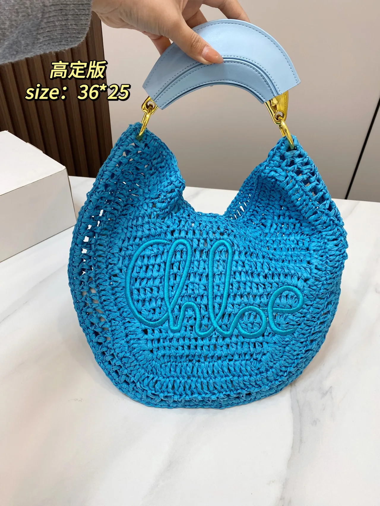 Chloe Banana woven shoulder bag in Blue / Pink / Orange / Black / Tan · view 1