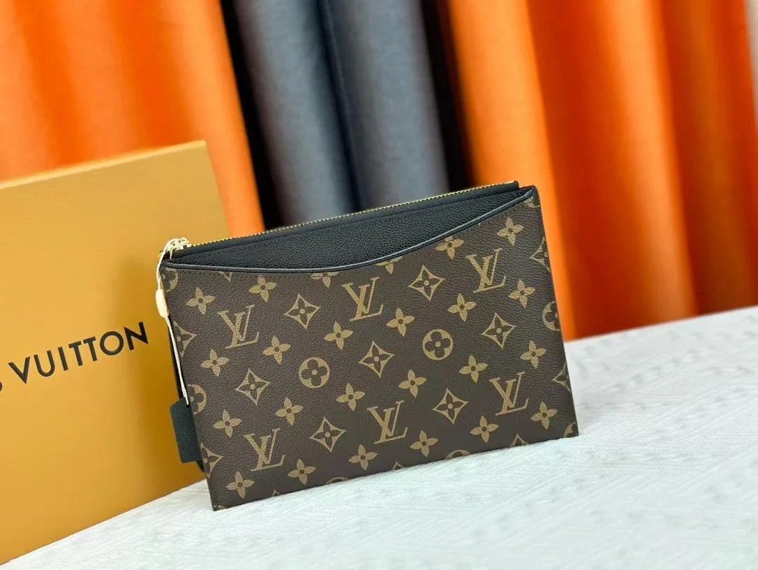 Louis Vuitton Calfskin Wristlet Pouch in Brown · view 1