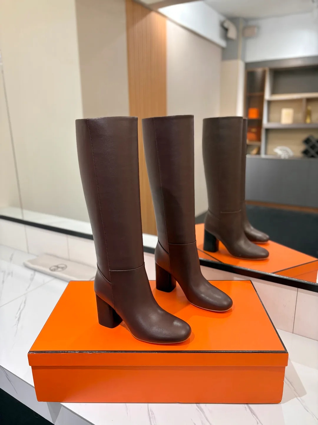 Hermes Cowhide Knee-High Boots in Brown · view 1
