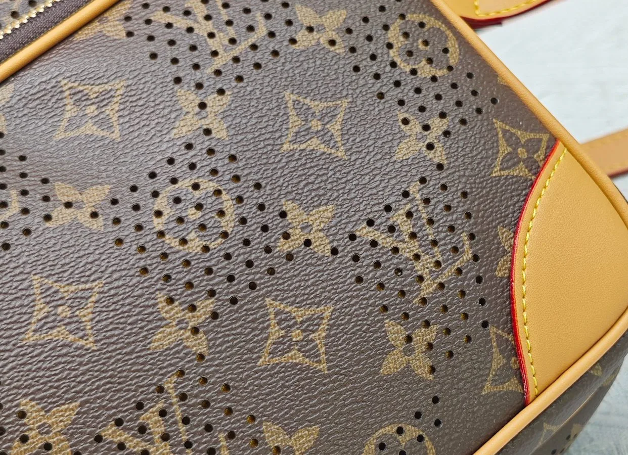 Louis Vuitton Cowhide Canvas Crossbody Bag in Brown · view 7