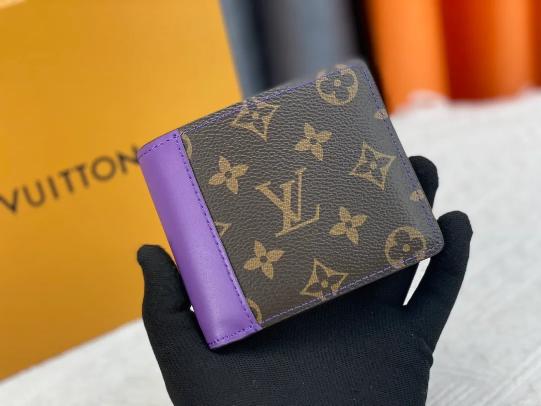 Louis Vuitton Canvas Monogram Wallet in Brown · view 1