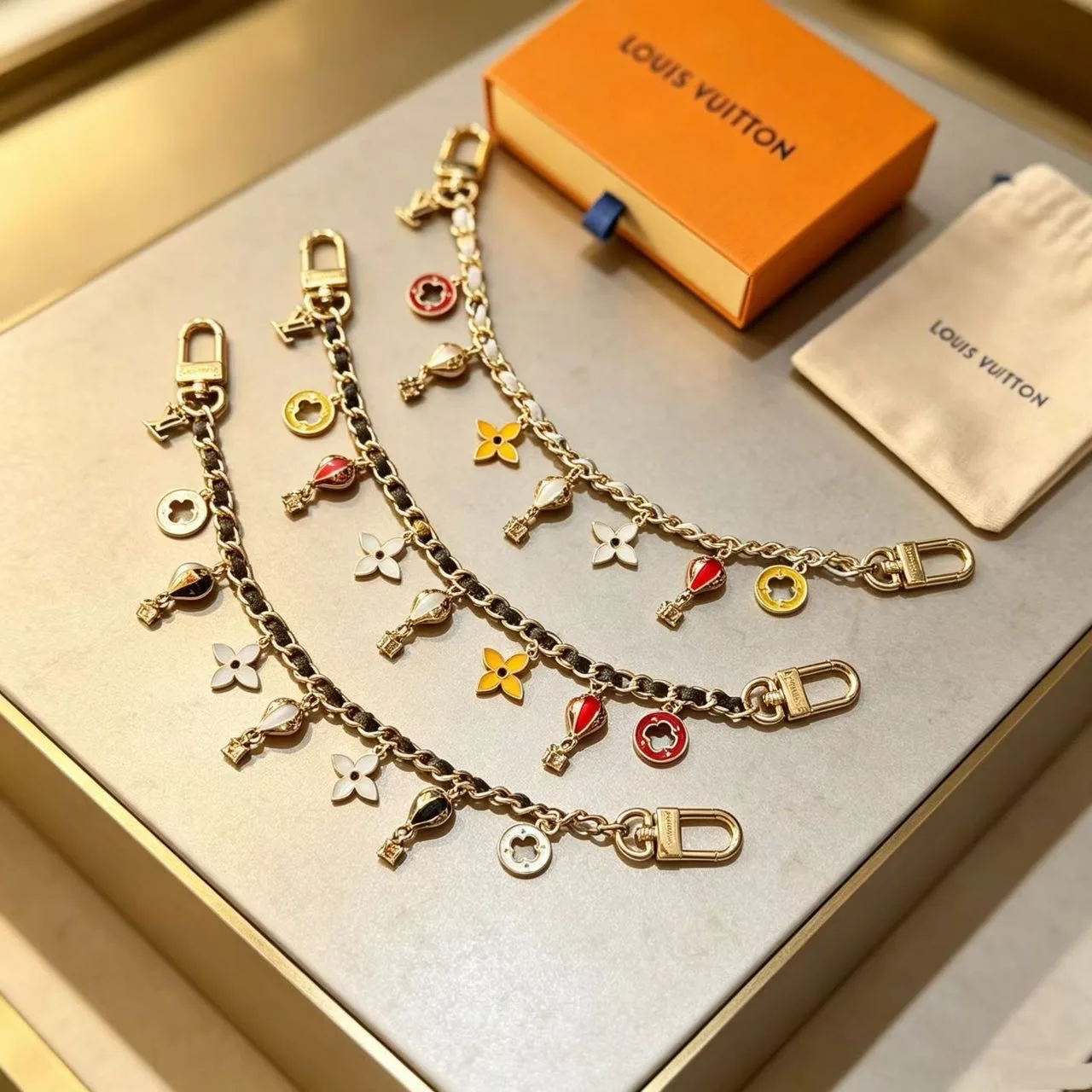 Louis Vuitton Hot-Air-Balloon and Flower Chain Charm in Gold · view 4
