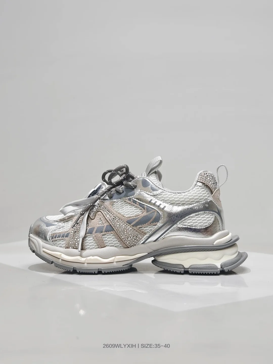 Balenciaga Glossy Bow Sneakers in Silver · view 1