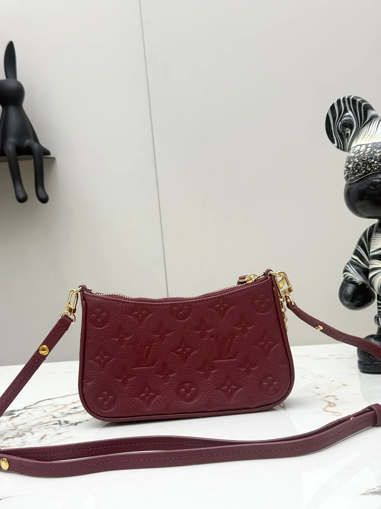 Louis Vuitton Leather Monogram Crossbody Bag in Burgundy · view 1