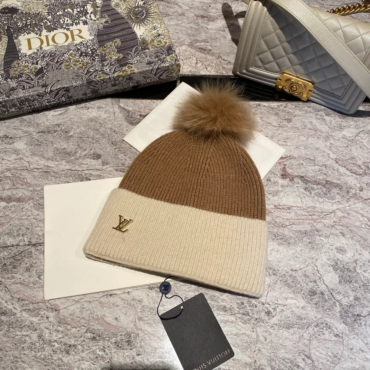 Louis Vuitton Pom-Pom Beanie in Beige & Brown & Cream & Black · view 1