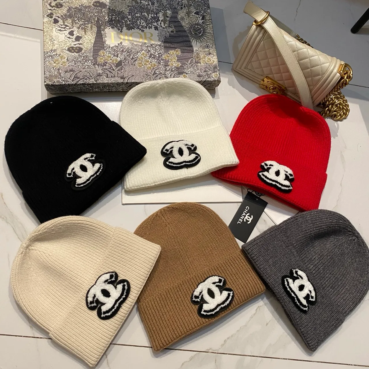 Chanel CC knit beanie in Black / White / Red / Grey / Beige / Tan · view 7