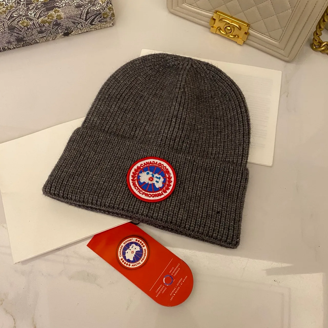 Canada Goose Ribbed beanie in Blue & White & Red & Grey & Black & Cream & Pink & Yellow & Orange & Brown · view 4