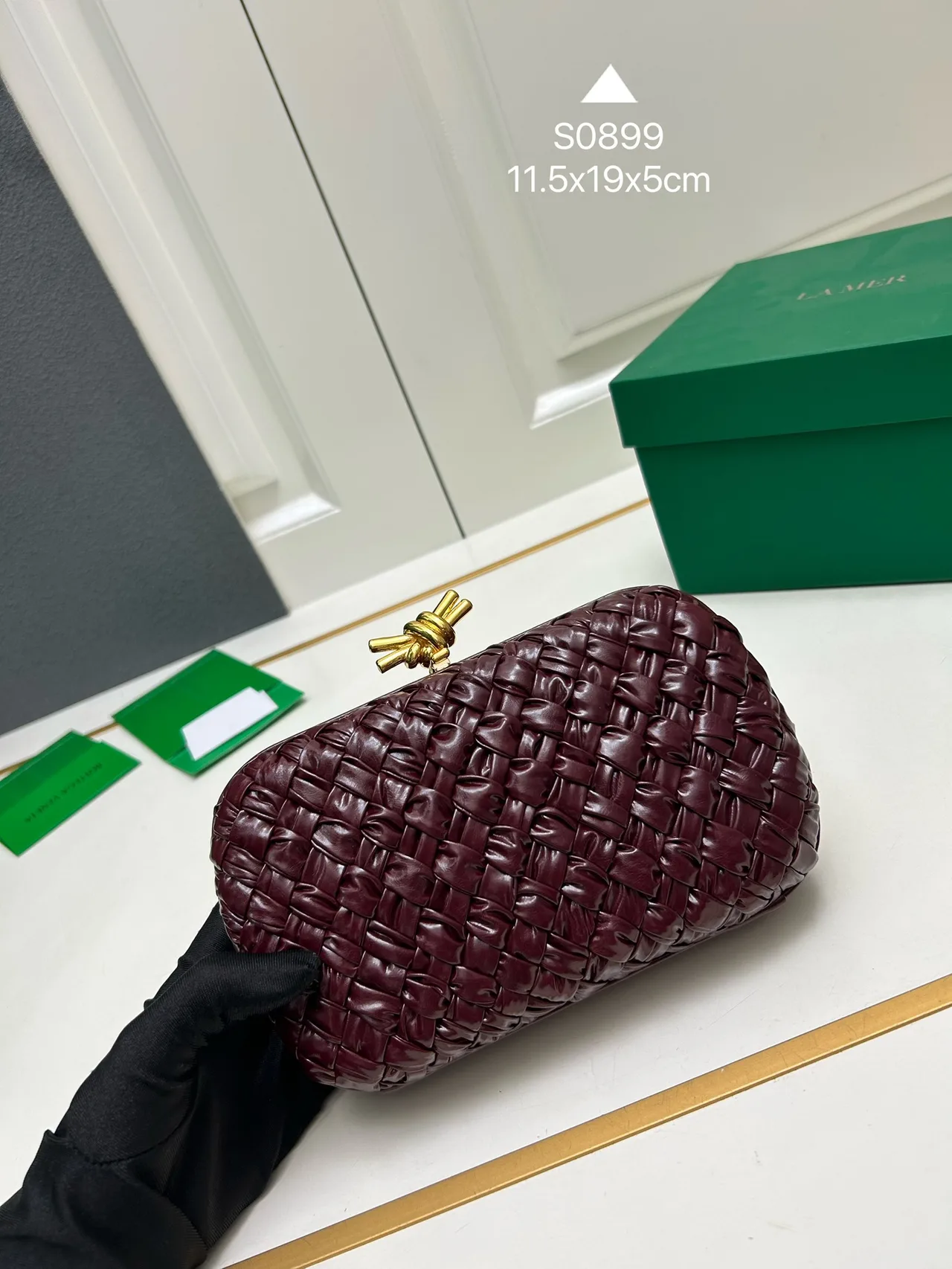 Bottega Veneta Woven Clutch in Burgundy · view 1