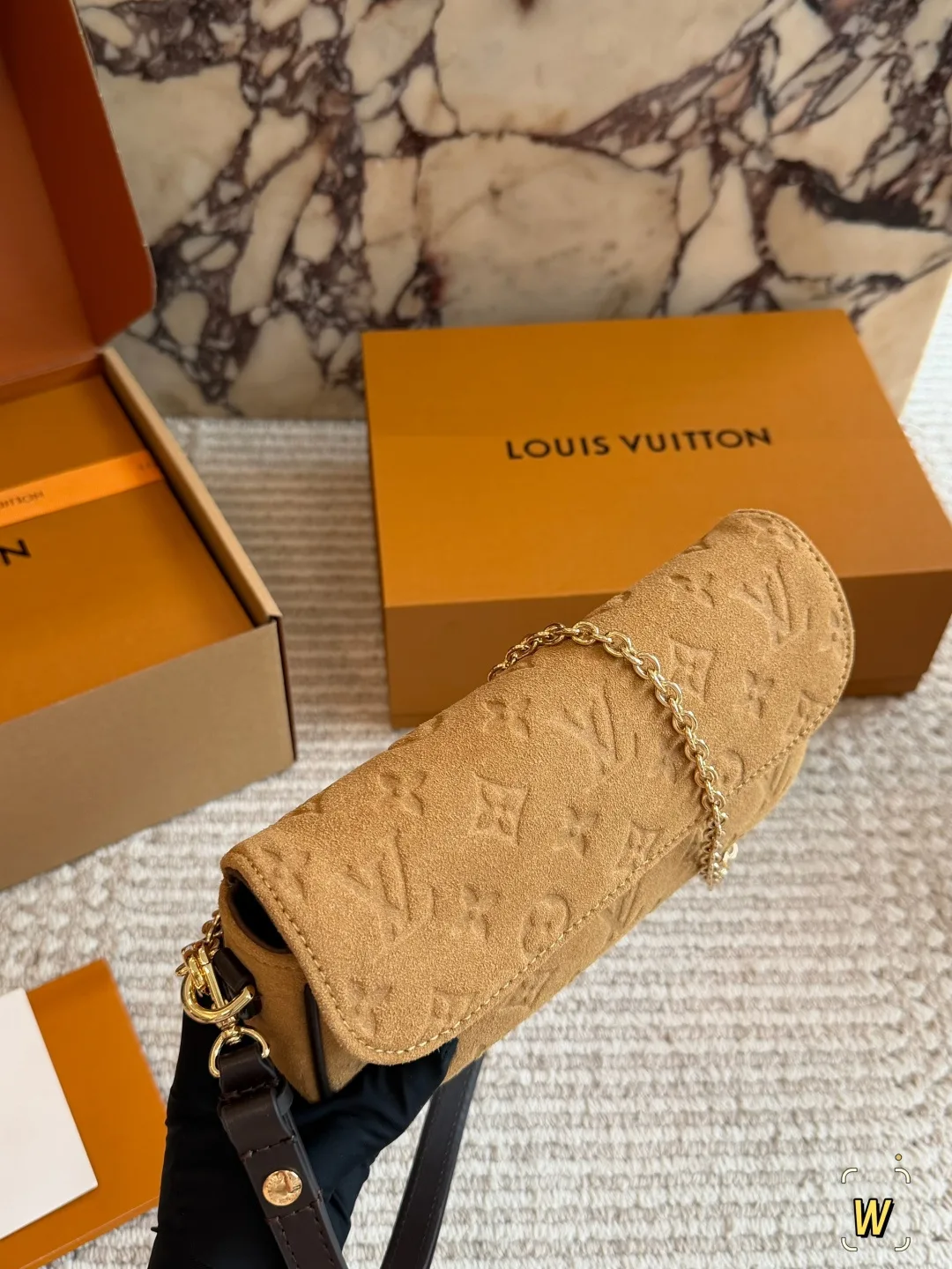 Louis Vuitton Suede Monogram Clutch in Tan · view 2