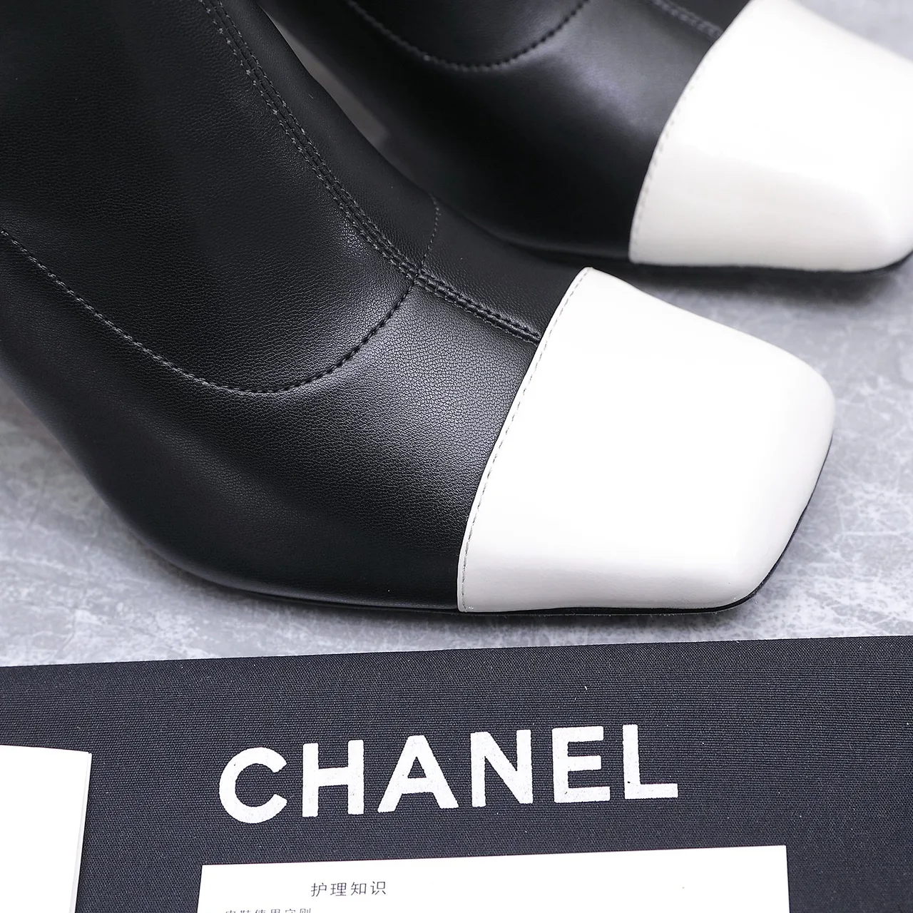 Chanel Cowhide Boots in Black · view 7