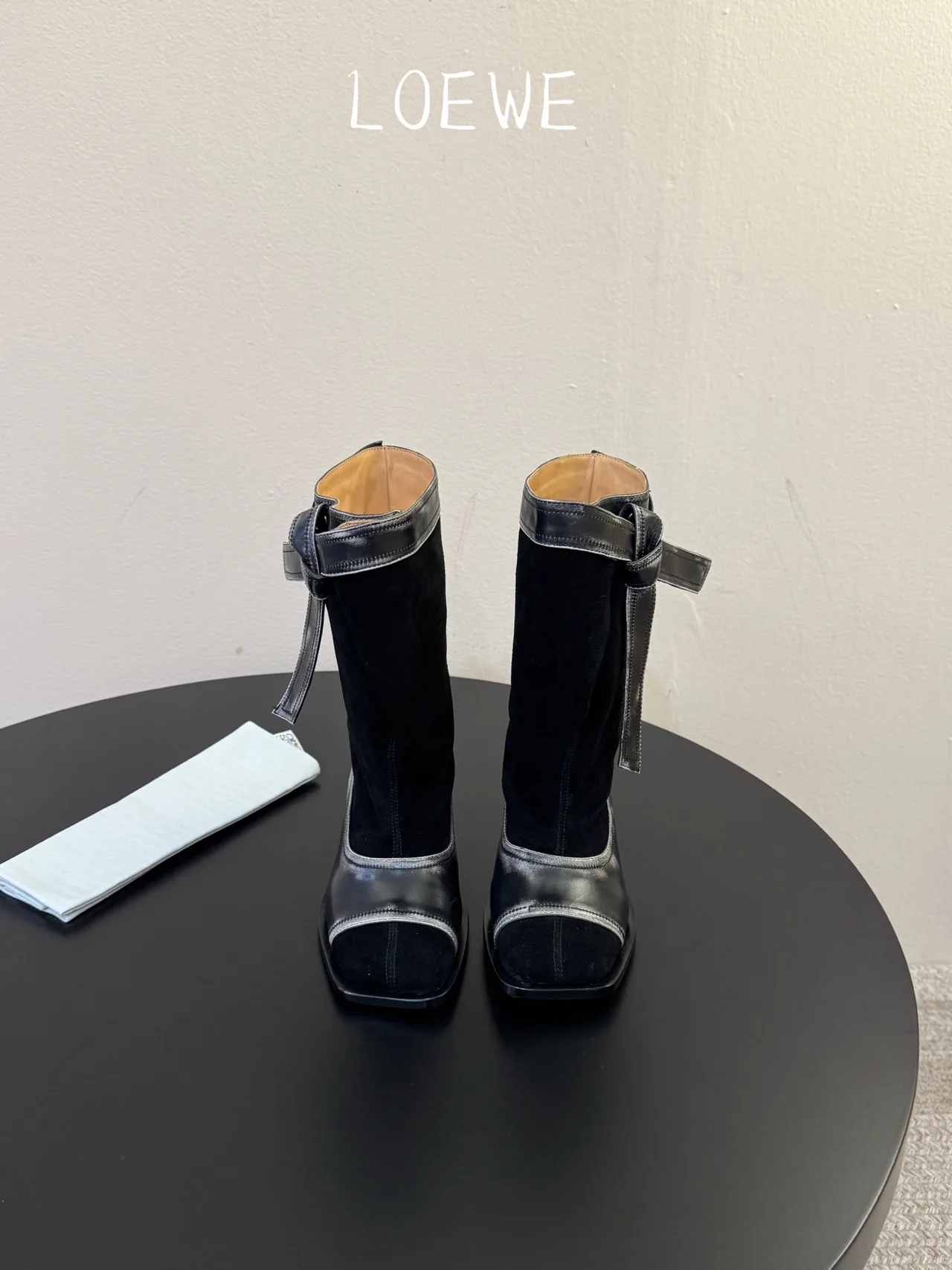 Loewe Cowhide Glossy Suede-Look Pointed-Toe Ankle Boots in Black · view 1