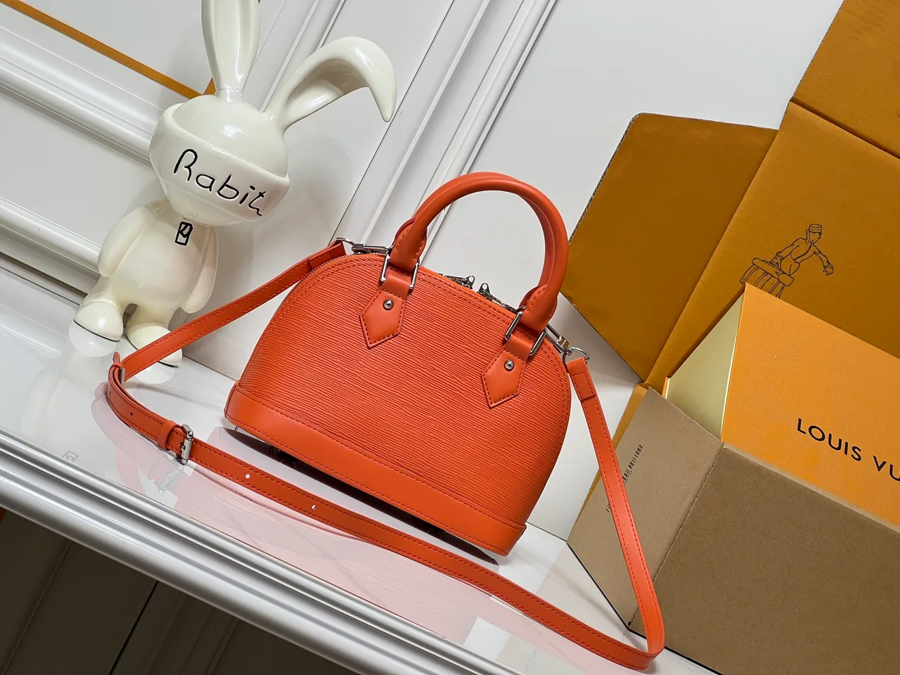 Louis Vuitton Leather Handbag in Orange · view 4