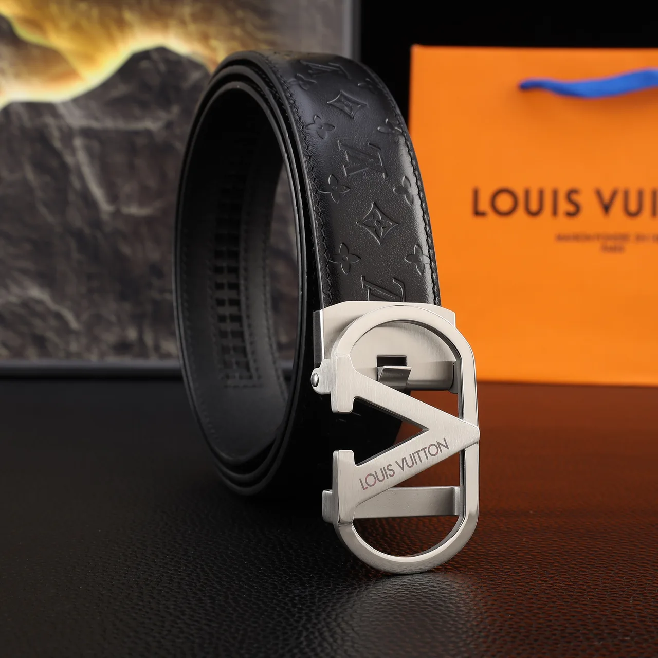 Louis Vuitton Embossed automatic V buckle belt in Black · view 1