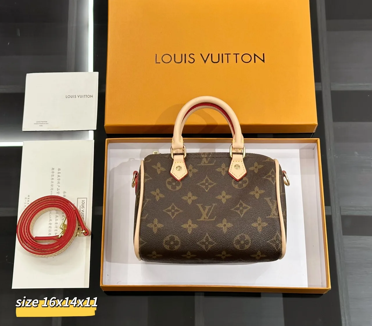 Louis Vuitton Alma Bag in Brown / White / Beige / Yellow · view 1