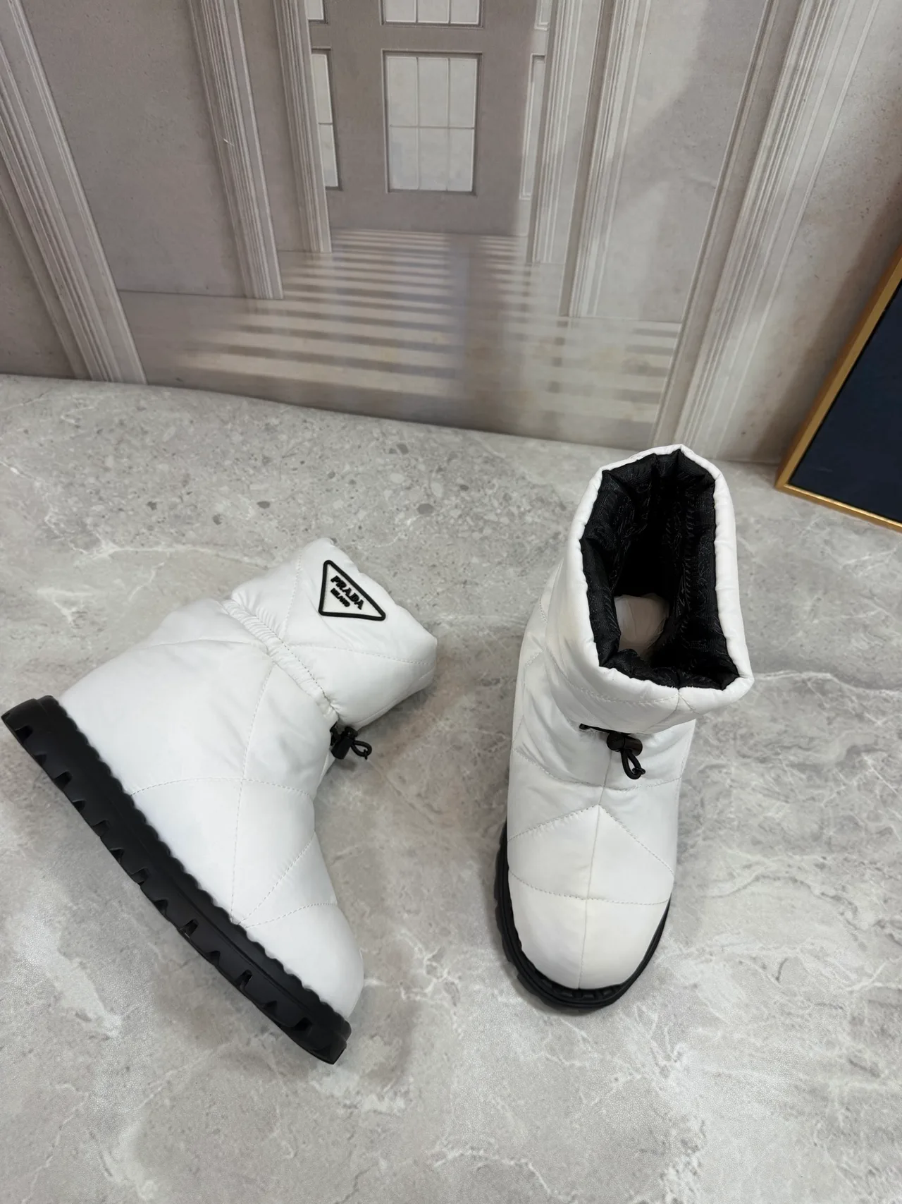 Prada Quilted Glossy Puffer Boots in White · view 4