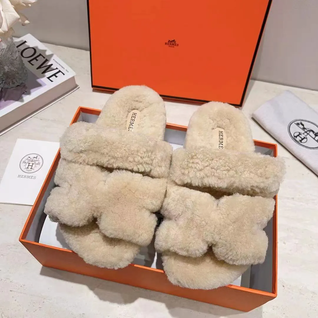 Hermes Sheepskin Chypre Shearling Slides in White · view 1