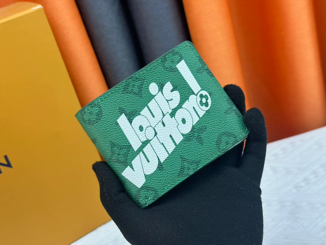 Louis Vuitton Canvas Wallet in Green · view 1