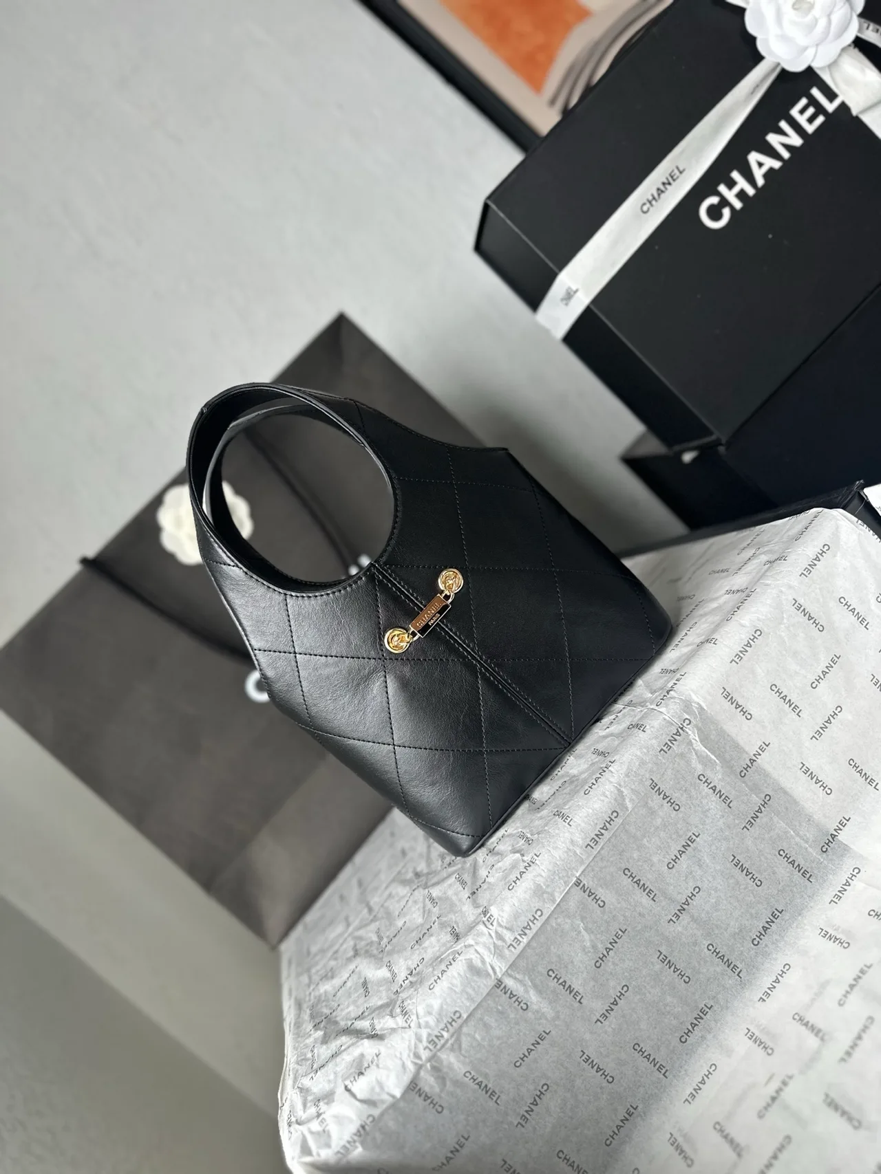 Chanel Leather Quilted Bucket Bag in Black · view 4