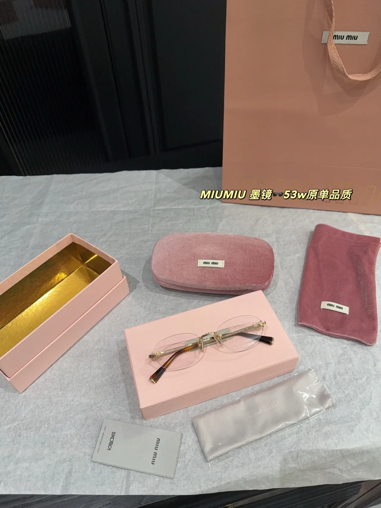 Miu Miu Rimless Glasses in Gold · view 2