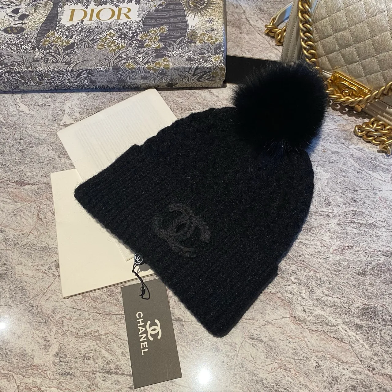 Chanel Pom Beanie in Black & White & Beige & Grey · view 1