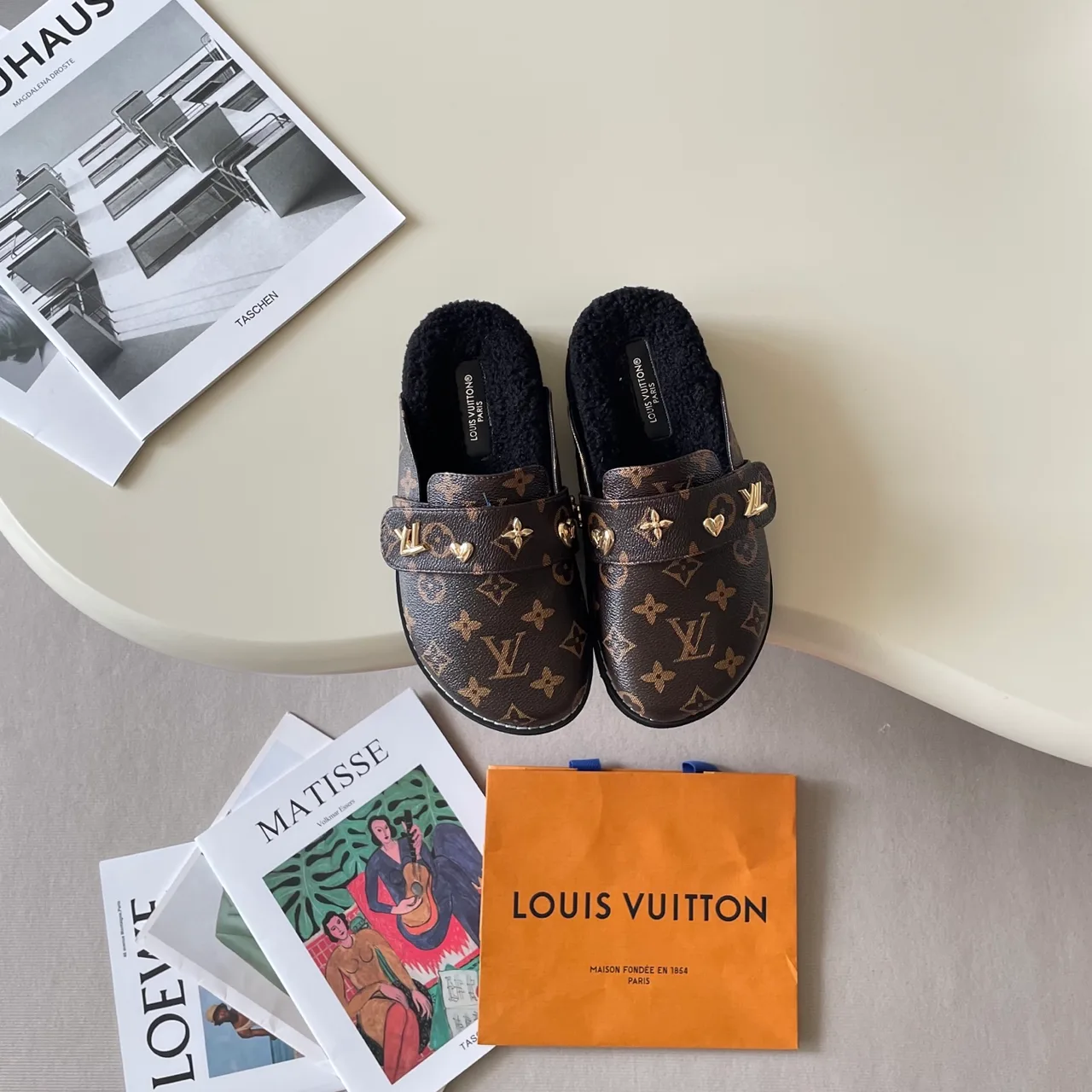 Louis Vuitton Horsebit Mules in Brown / Black / Blue · view 1