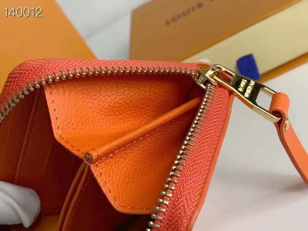 Louis Vuitton Zip Coin Wallet in Orange · view 9