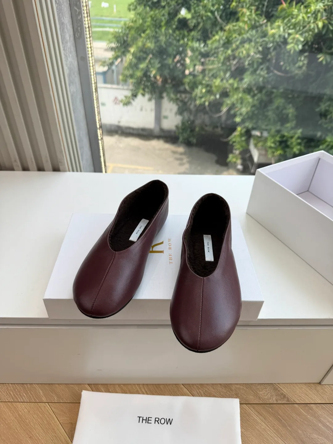 The Row Cowhide Matte Square-Toe Slippers in Burgundy · view 1
