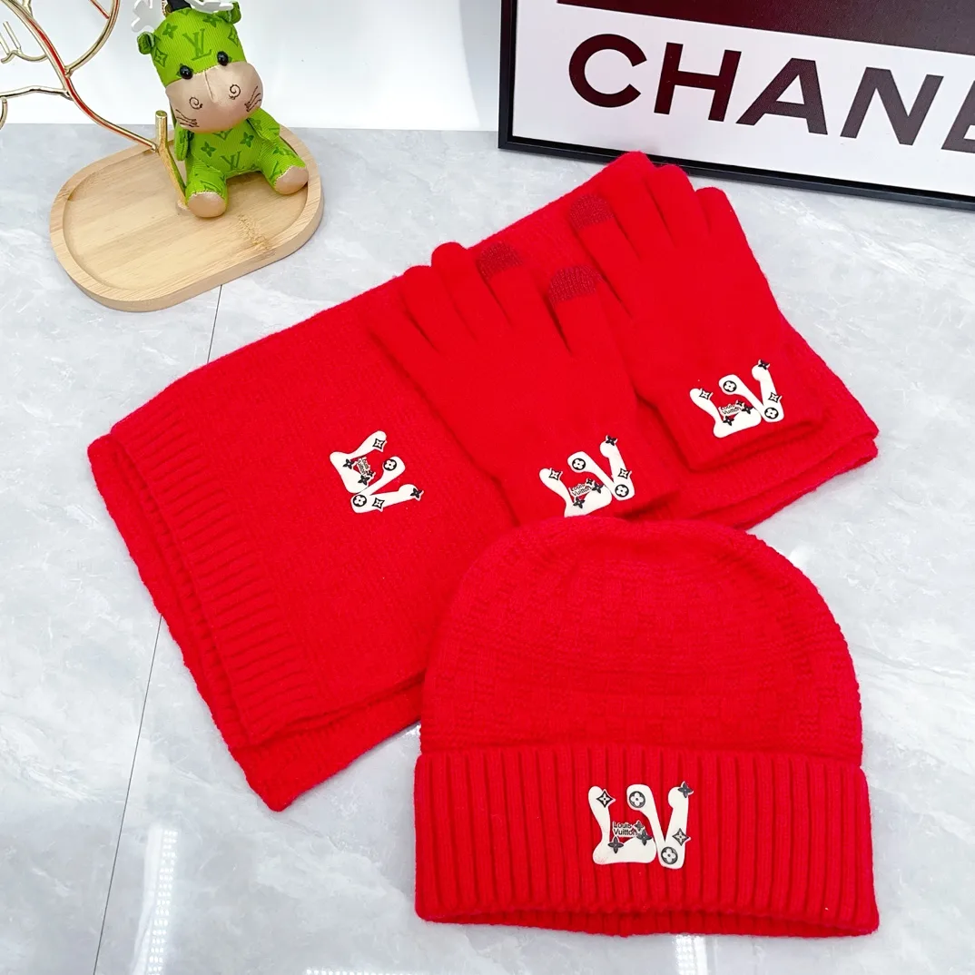 Louis Vuitton 50% Wool 50% Acrylic Ribbed Hat, Scarf and Gloves Set in Red · view 1